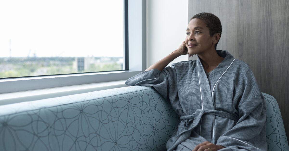 female patient looking out window