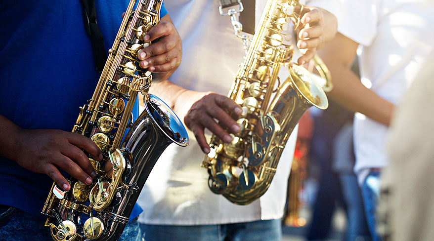 Jazz players perform on their saxophones in New Orleans, Louisiana.