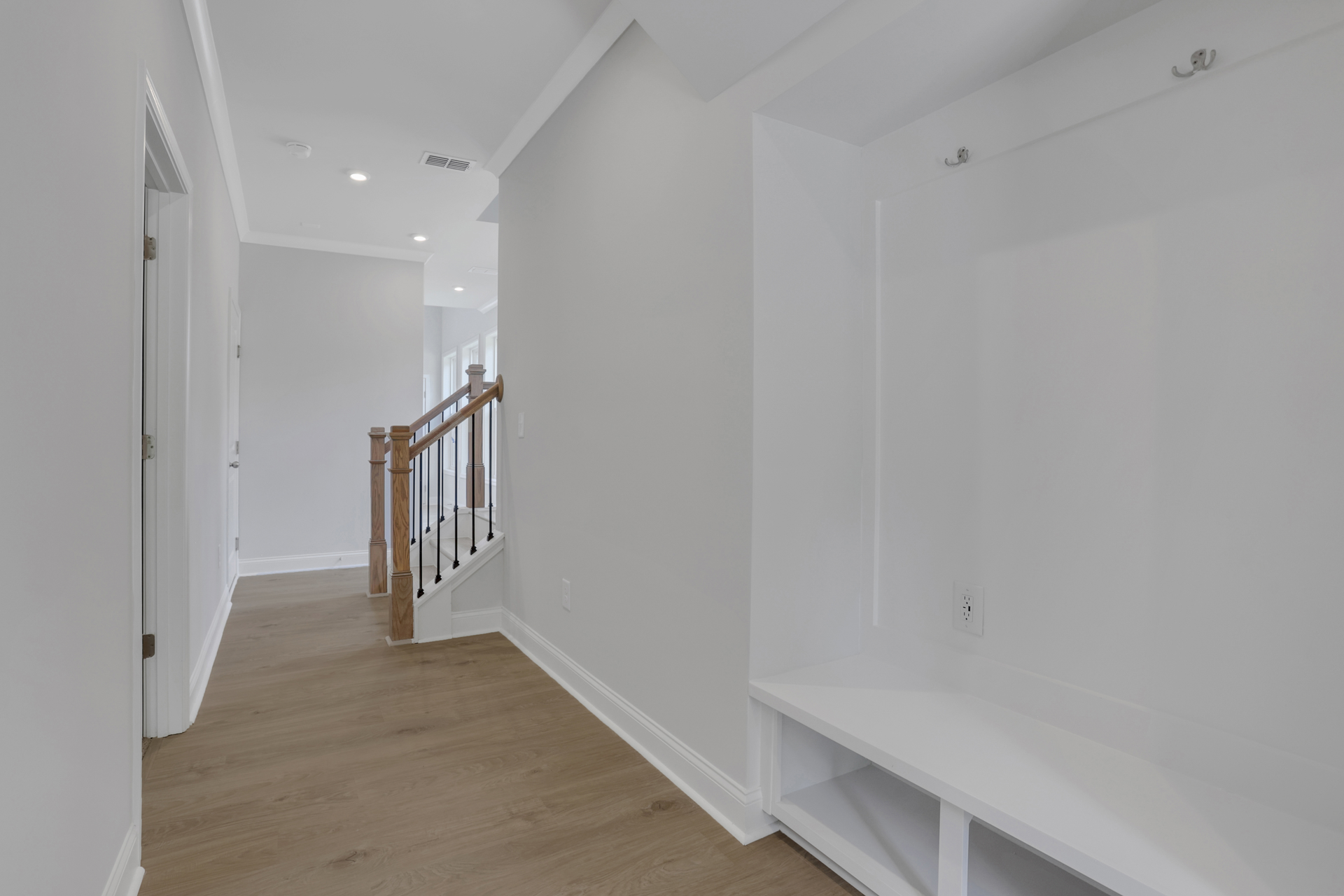 mudroom with valet and hard-surface flooring