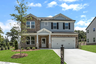 front of 2-story homes with brick and light siding