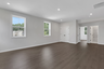 loft with hard surface flooring and windows