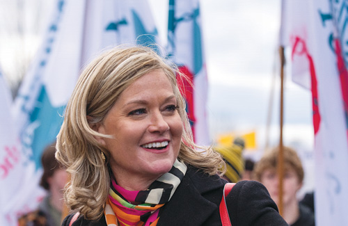 Jeanne Mancini, president of the March for Life Education and Defense Fund, walks with the crowd of tens of thousands of pro-life advocates toward Capitol Hill.