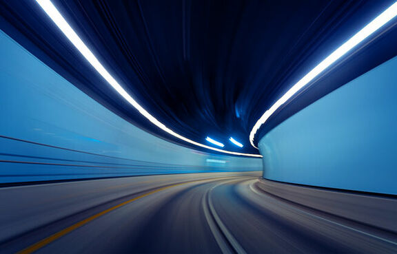 In-motion of driving through empty tunnel