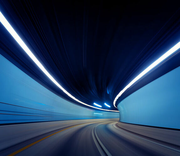 In-motion of driving through empty tunnel
