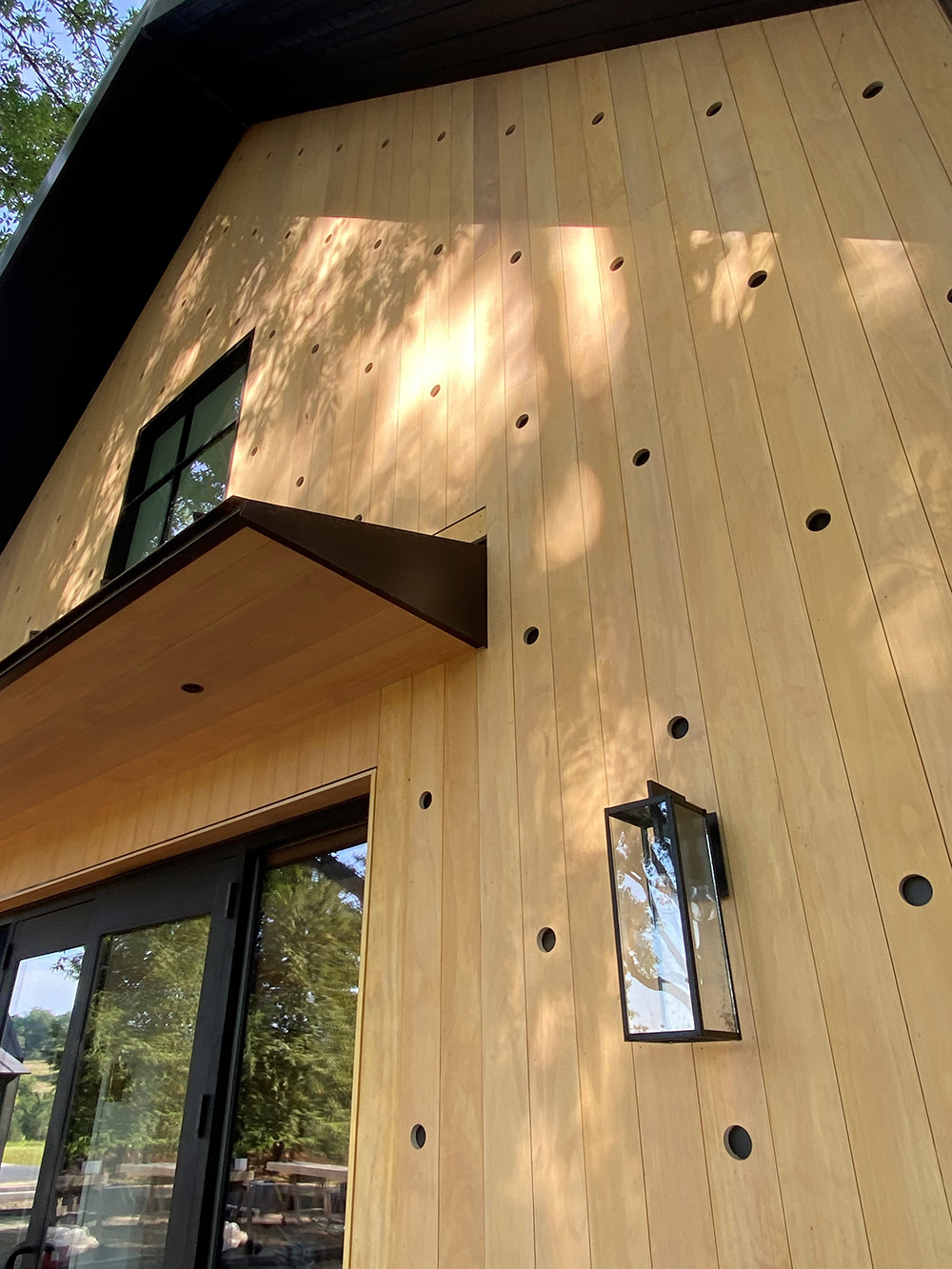 Accoya soffit and architectural detail work on a modern residential exterior