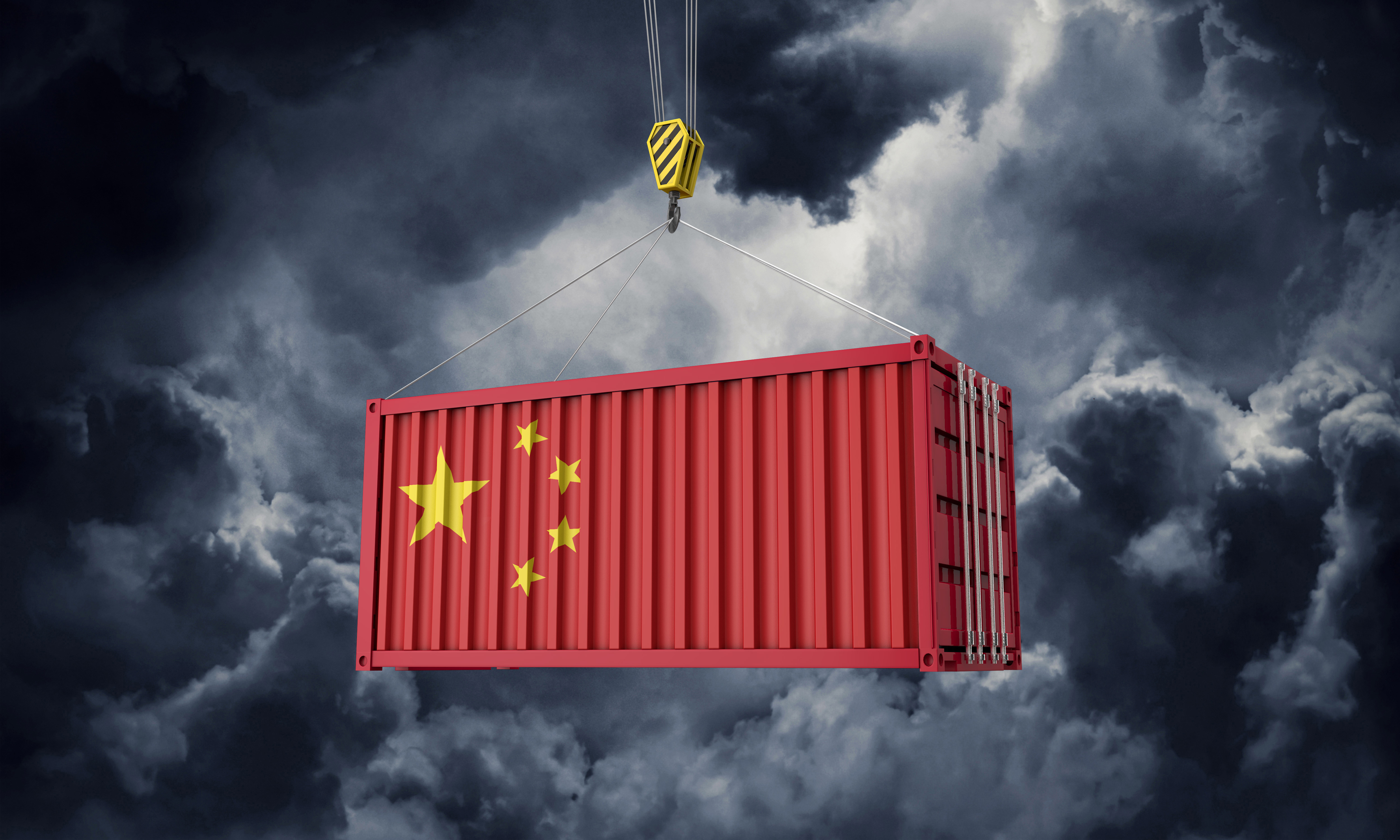 China flag on container with dark clouds in background