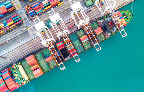 Aerial view of cargo ship in harbor