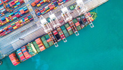 Aerial view of cargo ship in harbor