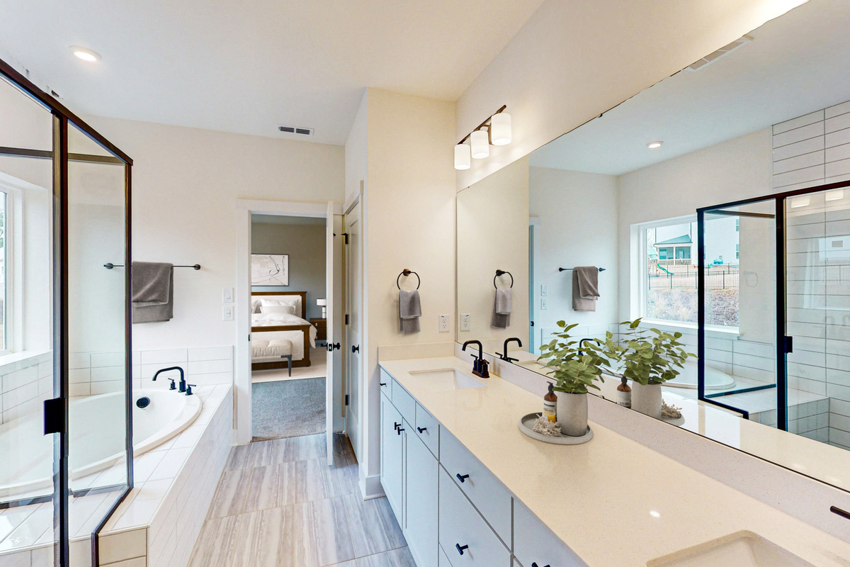 bathroom with two sinks and white counters