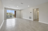 room with access to the balcony and the kitchen 