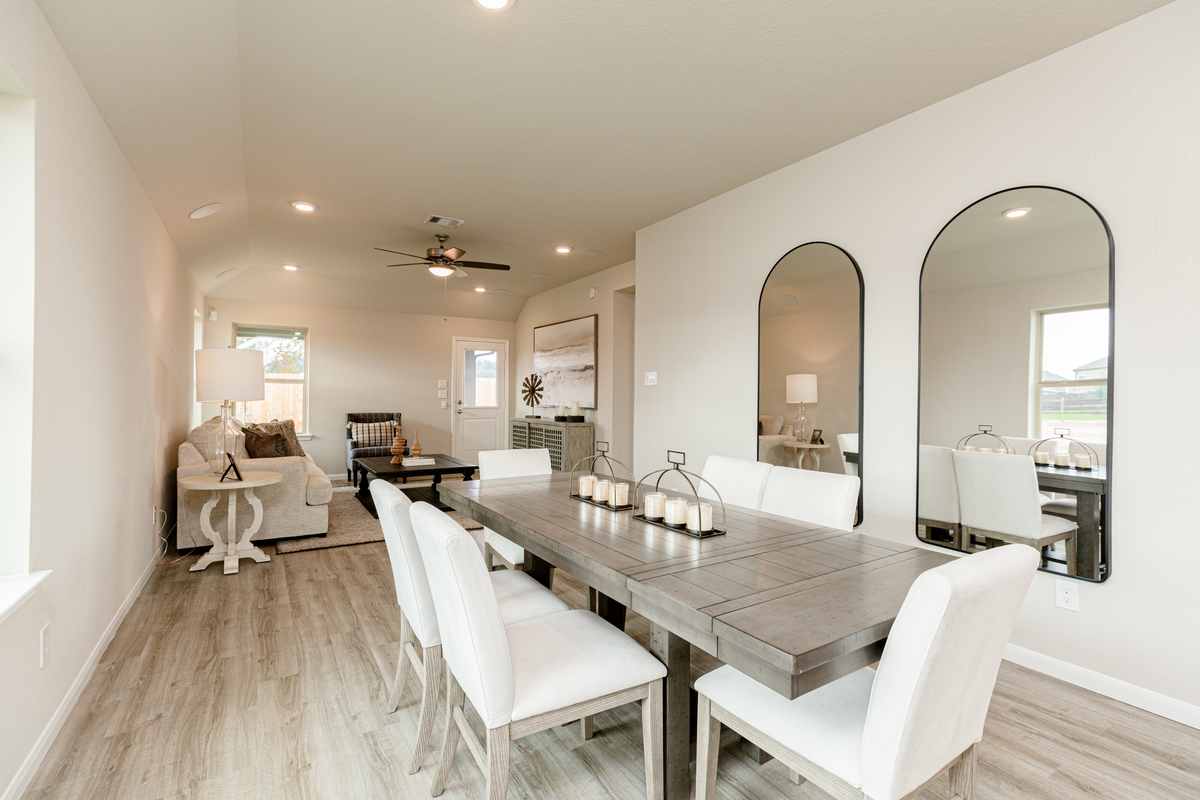 casual dining room with high ceilings