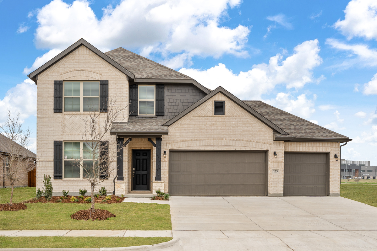 exterior of home with white brick and black siding