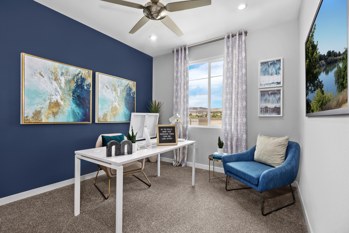 office with desk, chair and blue accent wall