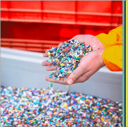 hands holding recycled materials