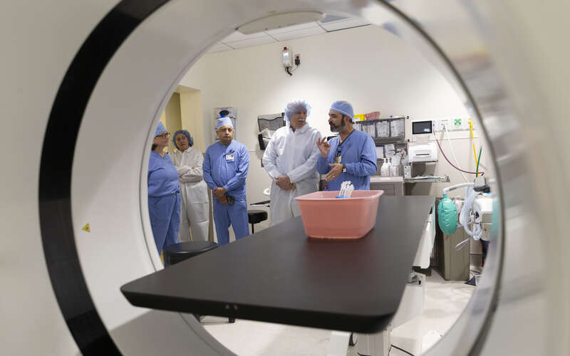 Richard and Melanie Gonzmart tour the new  Richard Gonzmart Brachytherapy Suite at Moffitt. 