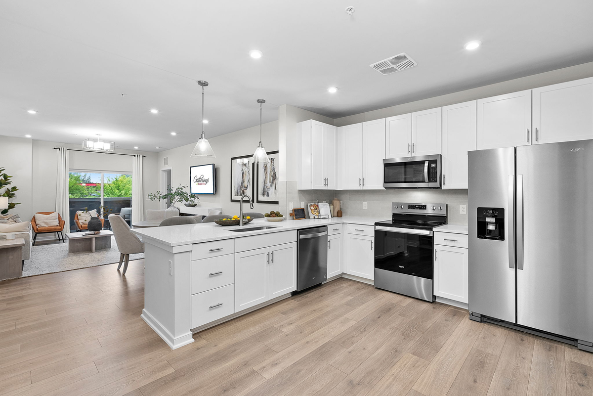 kitchen with quartz countertops and white cabinets