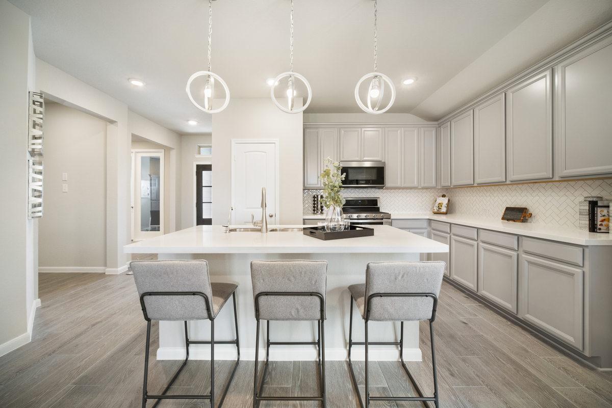 kitchen with mosaic backsplash