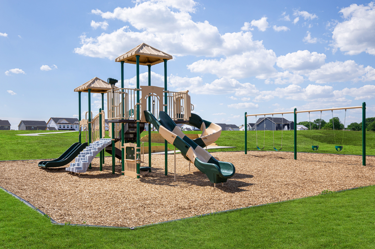 playground with slides and swing set 