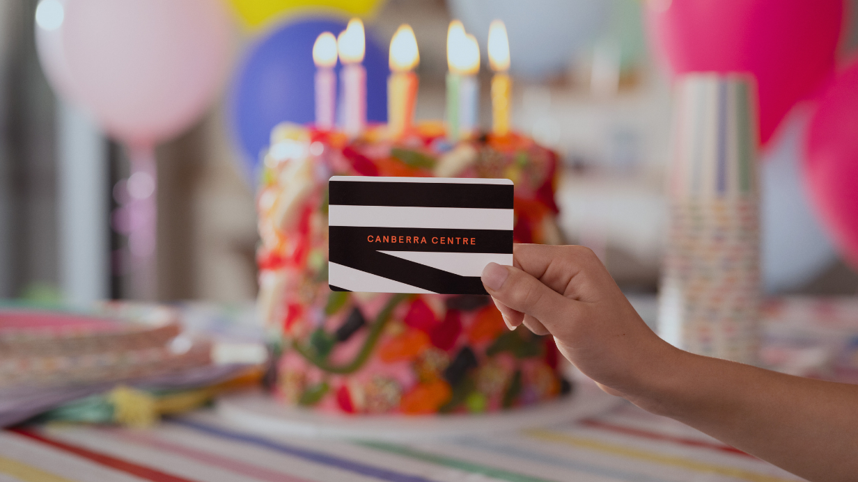 birthday cake with a Canberra Centre gift card