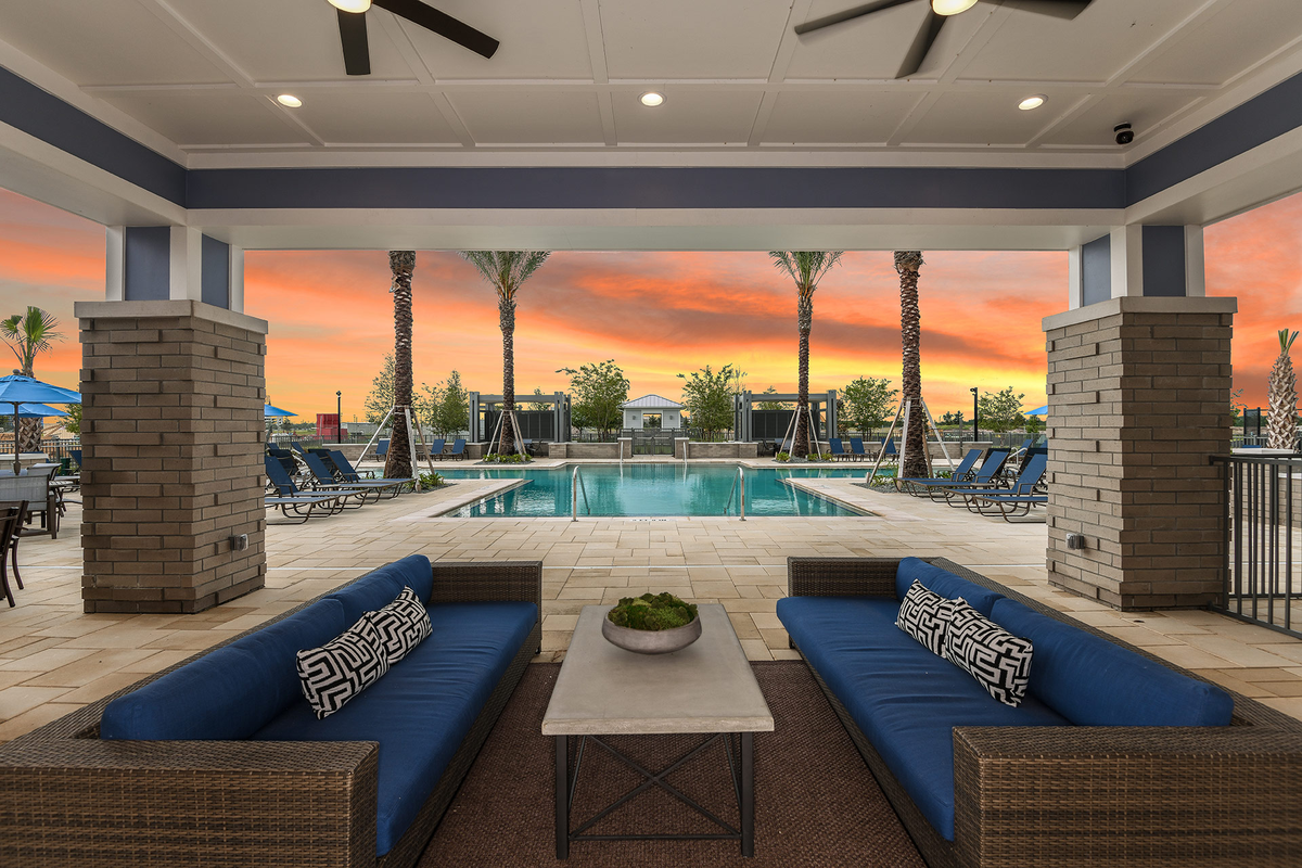refreshing community pool with seating