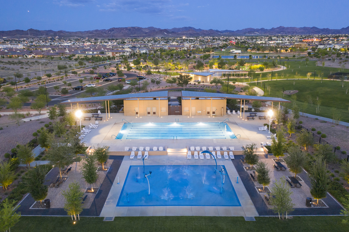 large pool with lights and view of the strip