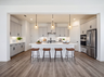 kitchen with neutral floors and white countertops