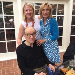Cameron Smith pictured with the late Alan Greenspan and his wife, Andrea Mitchell