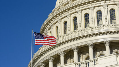 Washington capital building with American flag