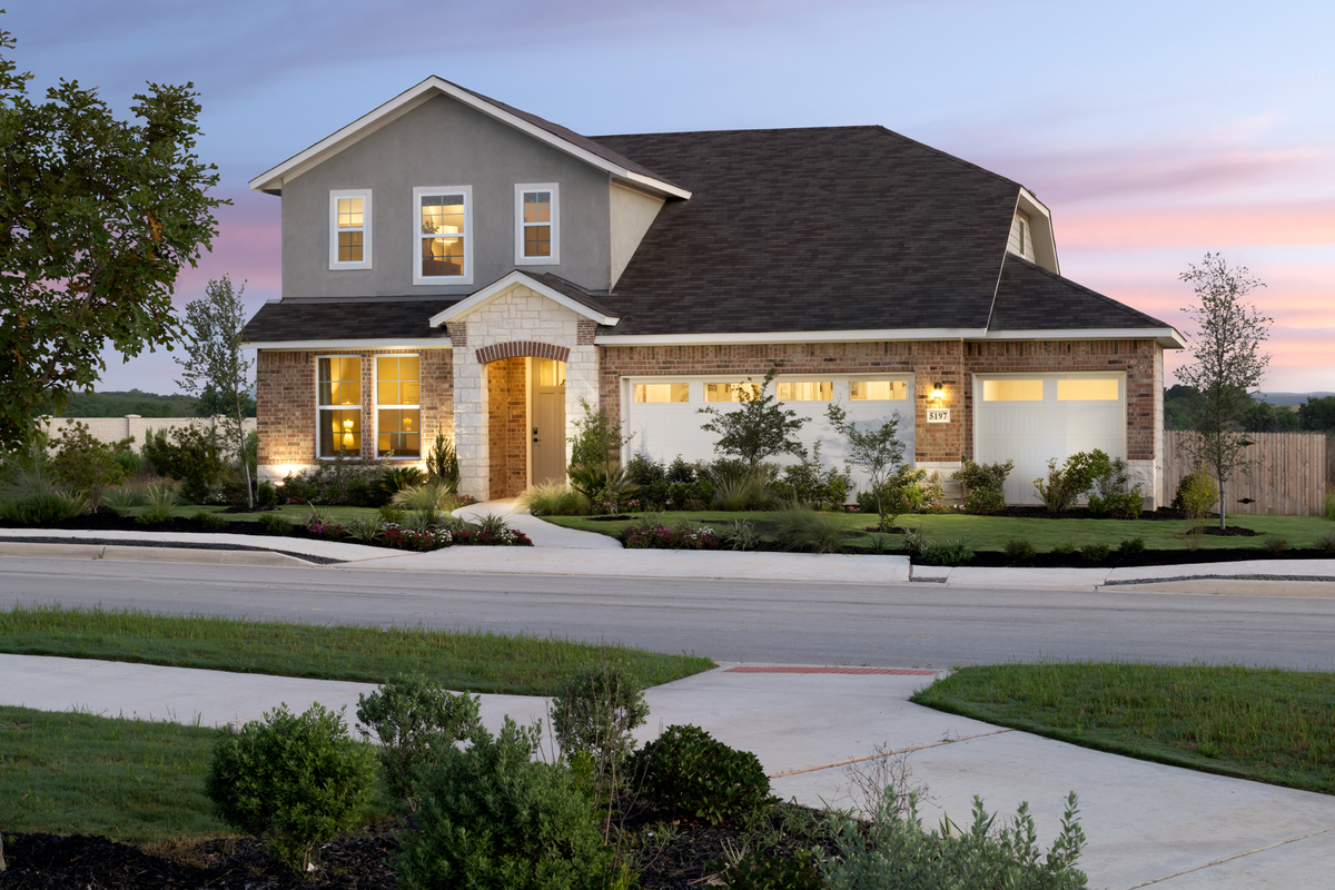 2-story exterior with brick and stone masonry