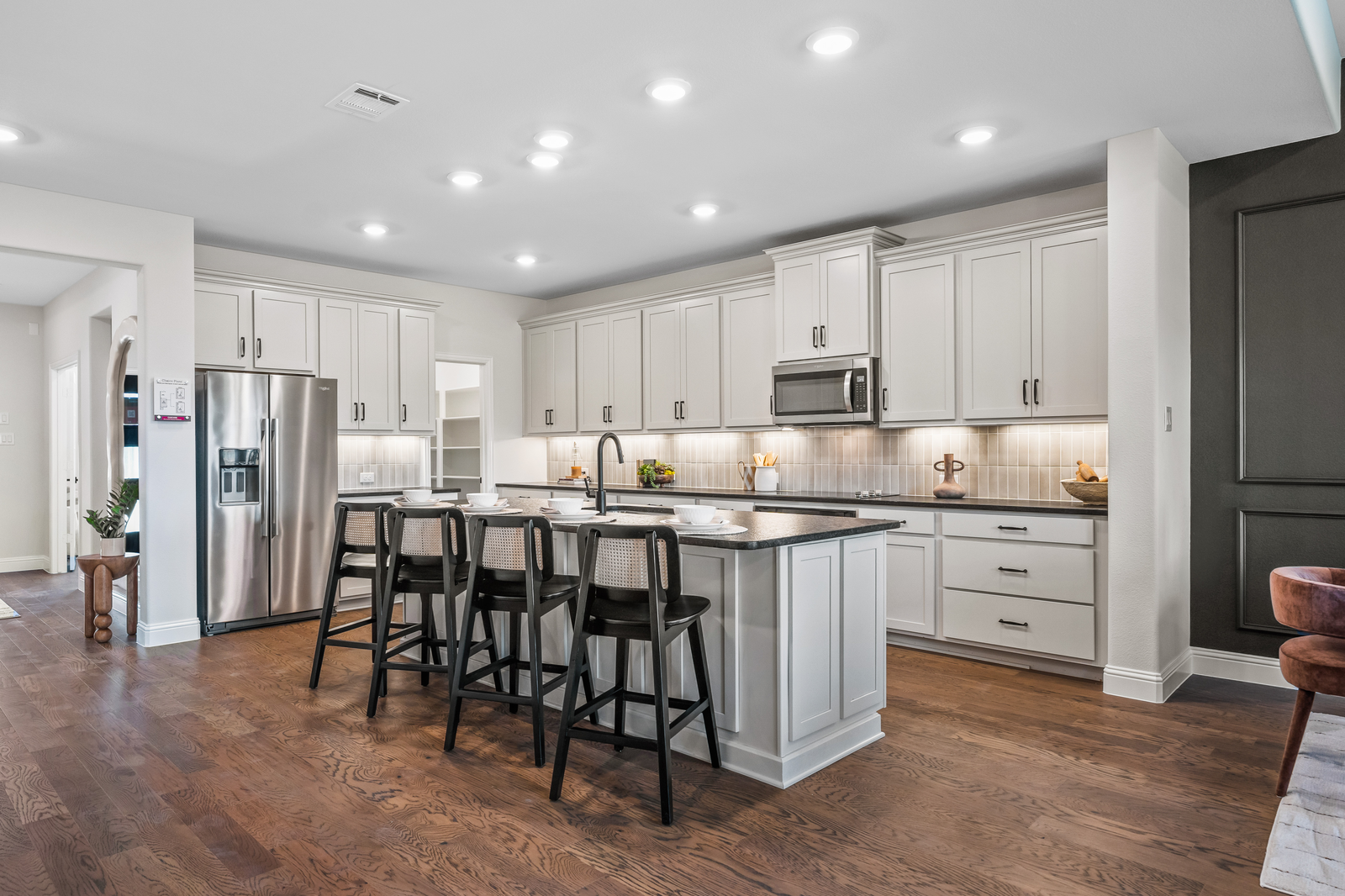 kitchen with white cabinets and hardwood floors