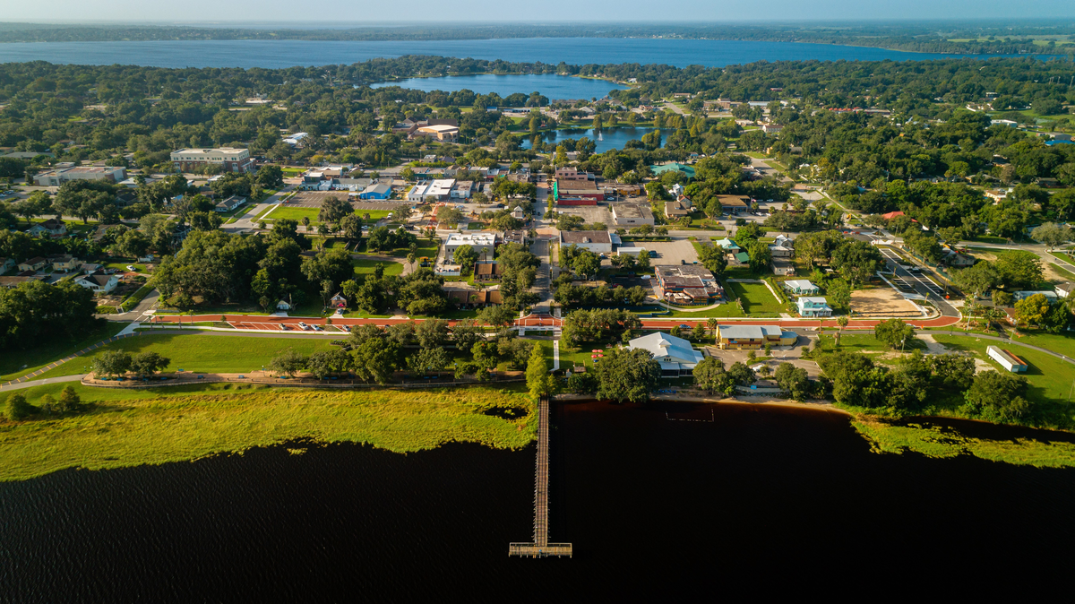 aerial image of downtown clermont including lakes