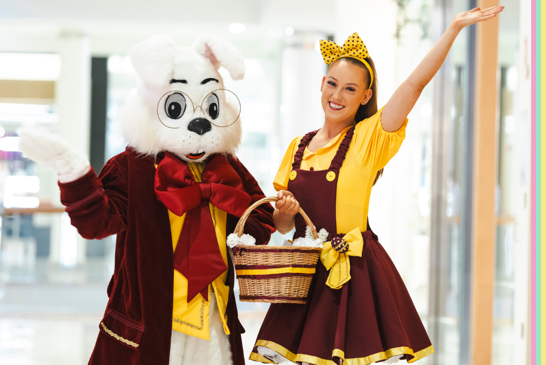 image of easter bunny and minder holding easter basket and smiling
