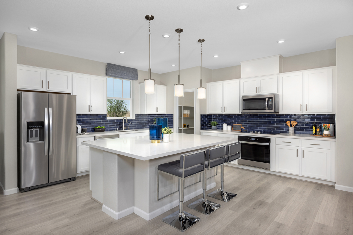 open and airy kitchen with white cabinets