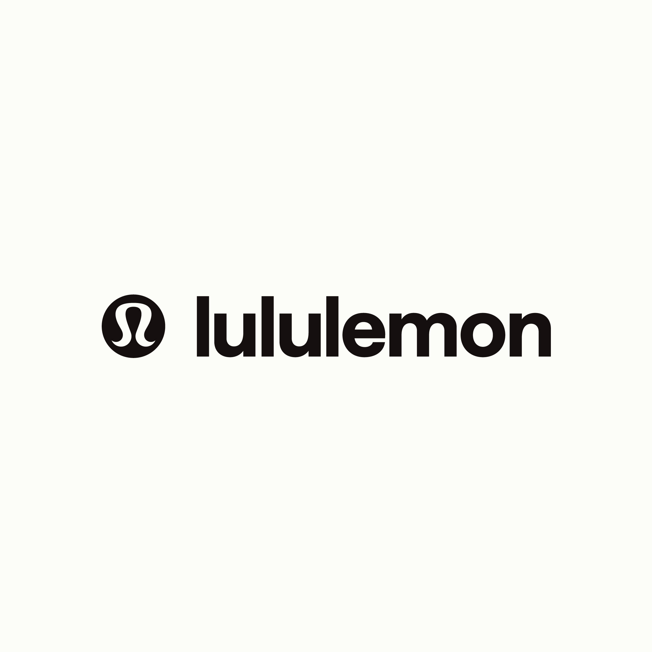 woman wearing white lululemon puffer jacket and white and black striped pants