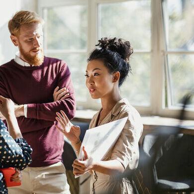 Group of people discussing business
