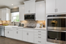 kitchen with white cabinets and stainless steel appliances