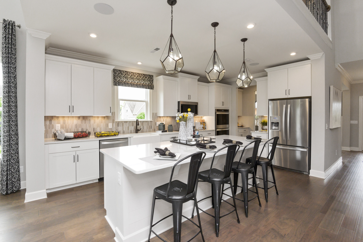 kitchen with white cabinets and white countertops