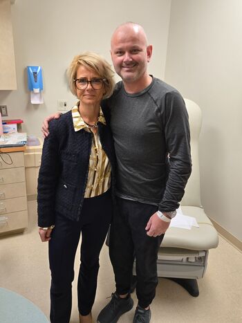 Photo of Dr. Druta and patient JP Malherbe