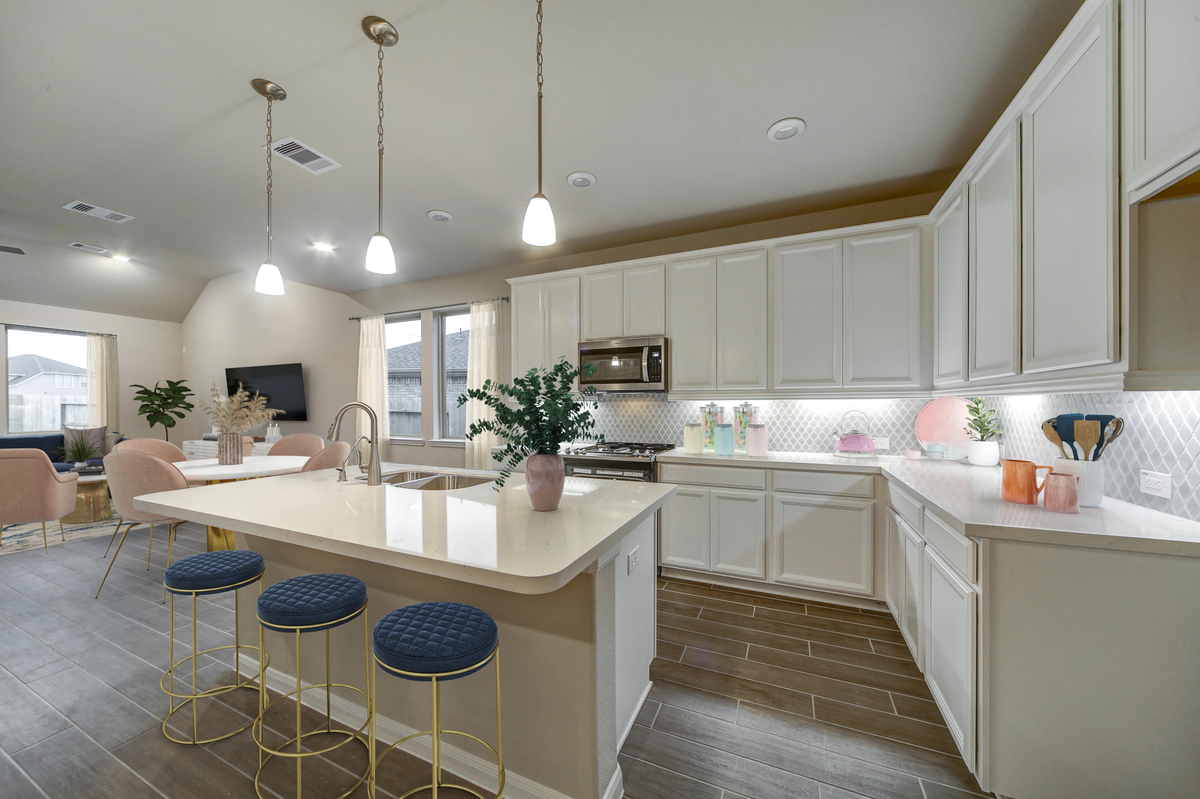 kitchen with island and white cabinets 