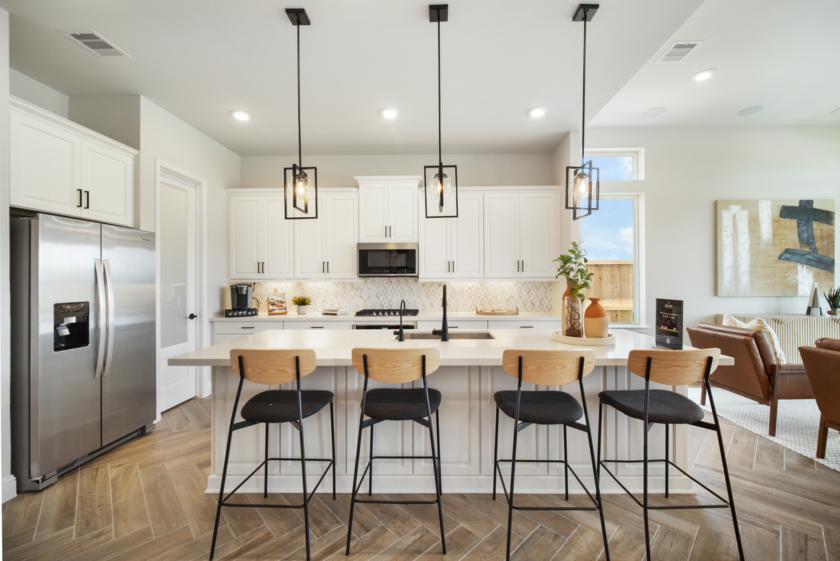 kitchen with large island and white cabinets 