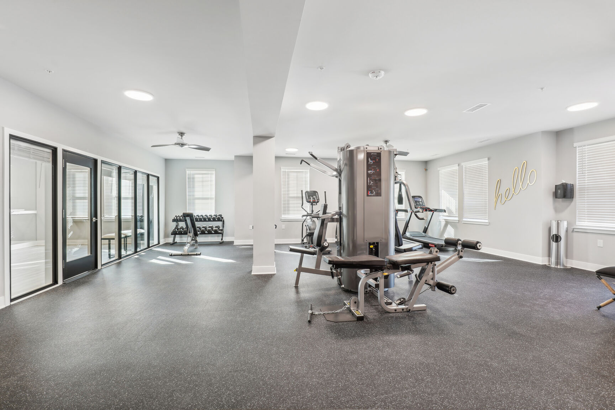 fitness center with machines and free weights