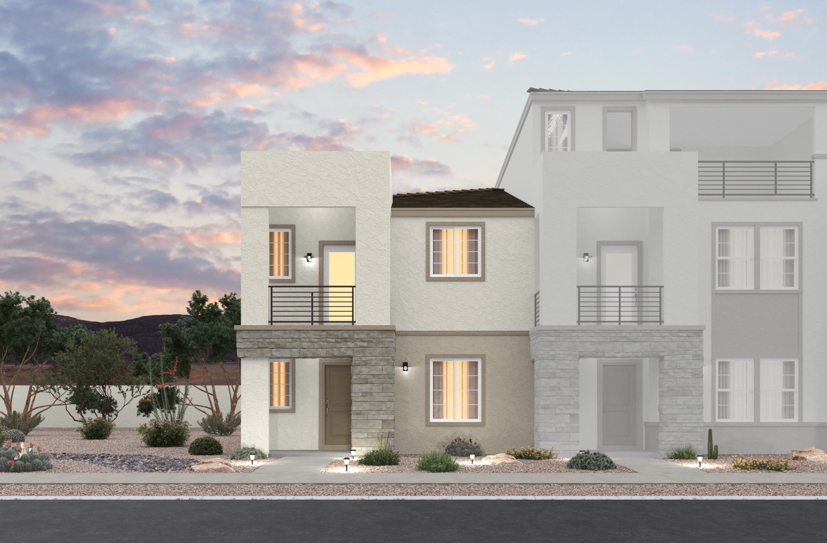 desert landscaping and townhome with balcony
