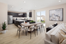 dining area with neutral floors near kitchen