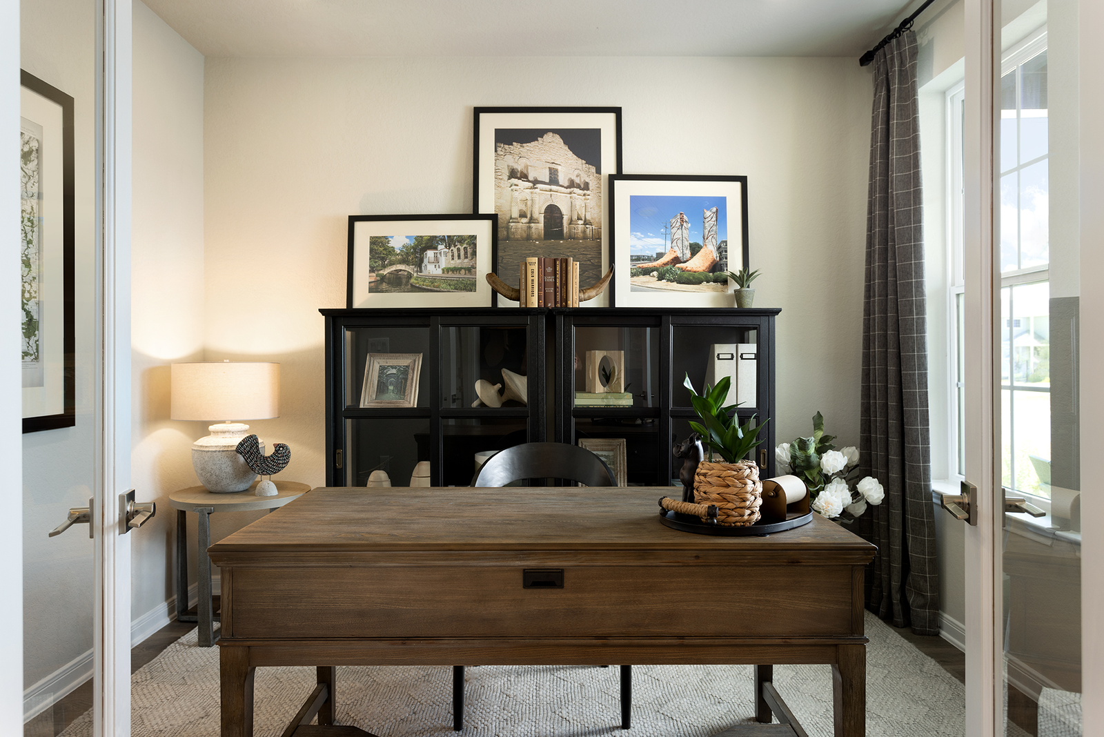 study with desk & pictures on the wall