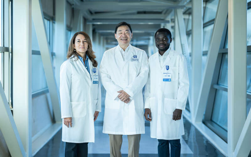 From left, Ana Lucia Dominguez, Dr. Patrick Hwu and Saheed Oseni. Members of Dr. Hwu's lab