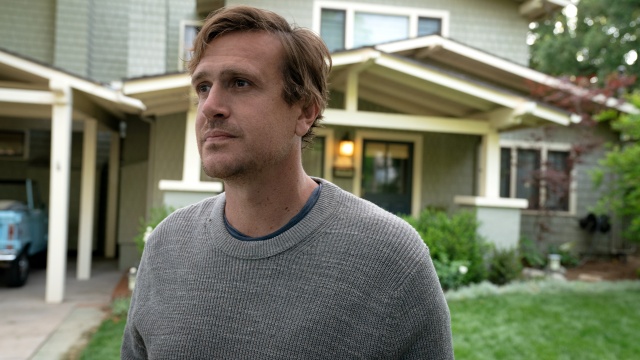 Jason Segal as Jimmy Laird looking out across the street in Shrinking