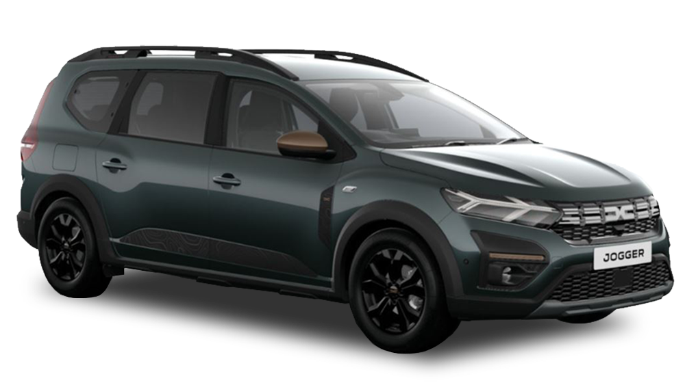 A dark green Dacia Jogger estate car driving along a countryside road, surrounded by fields and trees.