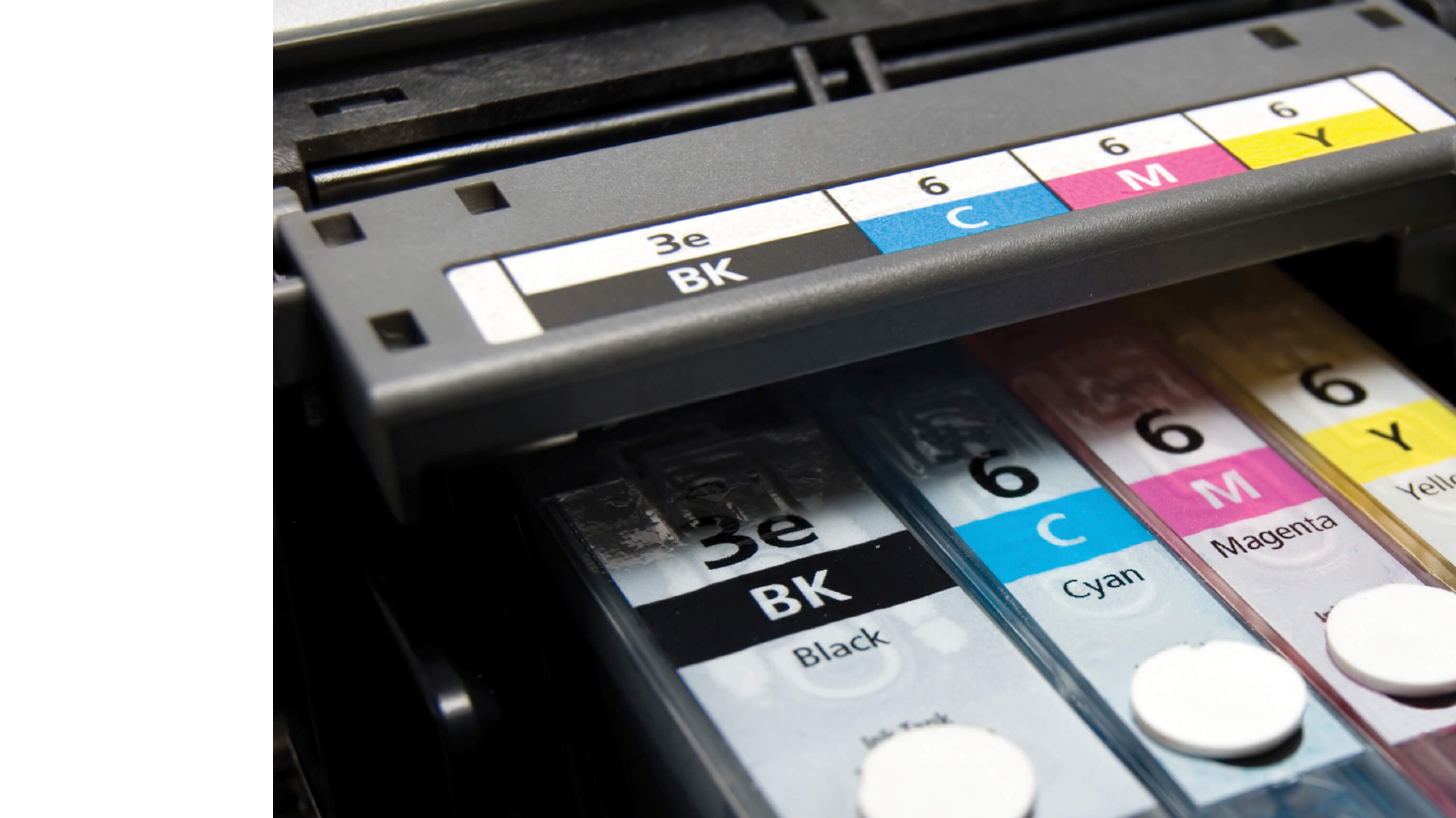 MANH-masthead-Kolok-desktop.jpg Image of black and colored ink cartridges.