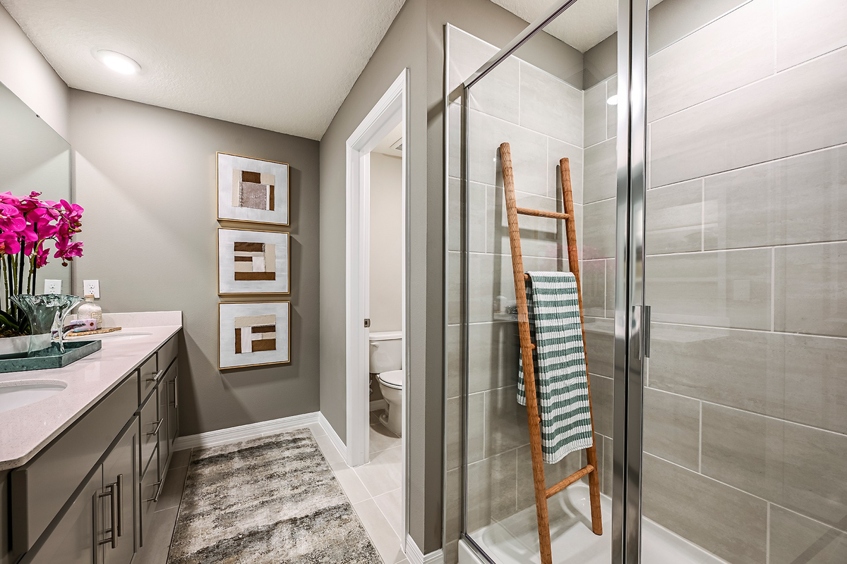 primary bathroom with enlarged tile shower