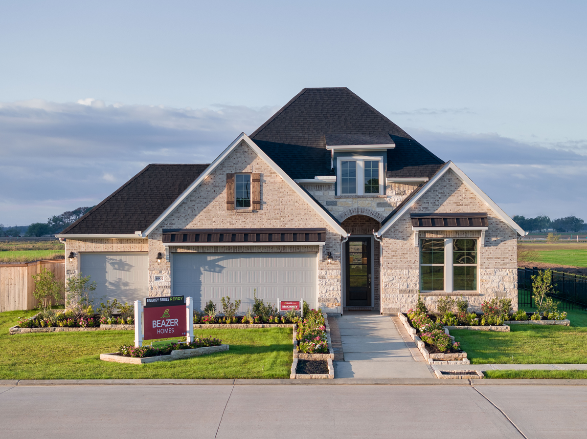 home exterior with brick and stone